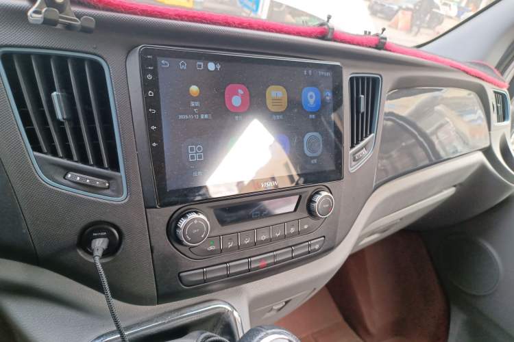 Used Foton Toano 2023 Joy Elephant Multi-Function 2.0T Manual Long-Wheelbase Mid-Roof Model with Single Rear Tire Available in 5/6/7/9-Seater Configurations Audio And AC Panel