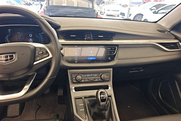 Used Geely Auto Emgrand 2019 Leading Edition 1.5L Manual Upgraded Connectivity Model China V Standard Audio And AC Panel