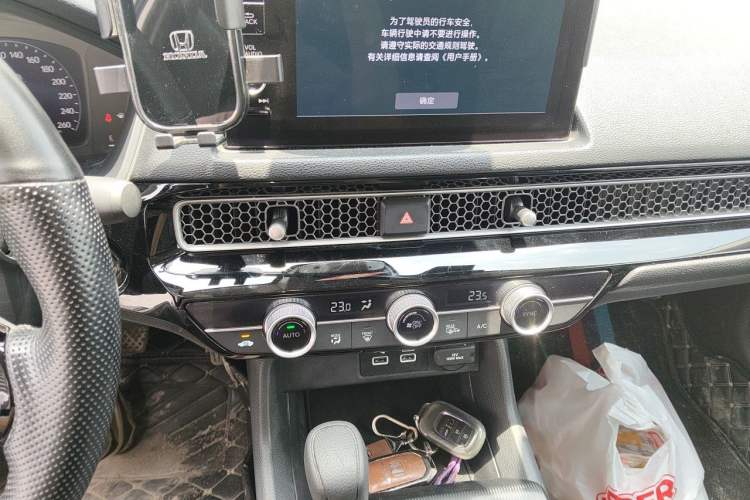 Used Honda Civic 2023 240TURBO CVT Dynamic · Center Stage Special Edition Audio And AC Panel