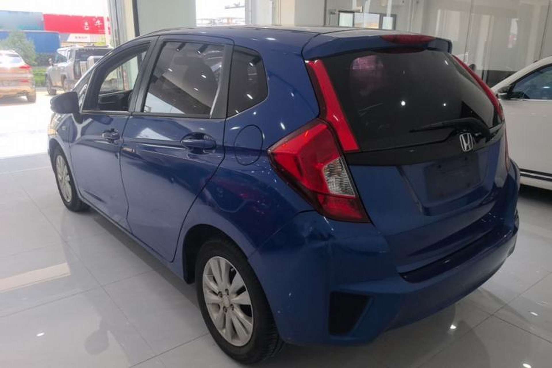 Used Honda Fit 2014 1.5L LX CVT Comfort Model Rear Left 45 Deg
