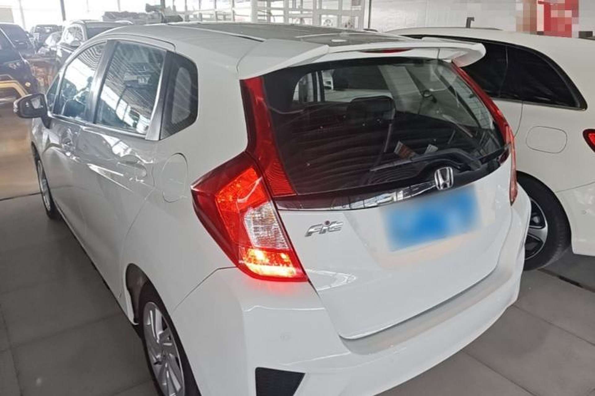 Used Honda Fit 2014 1.5L SE CVT Fashion Model Rear Left 45 Deg