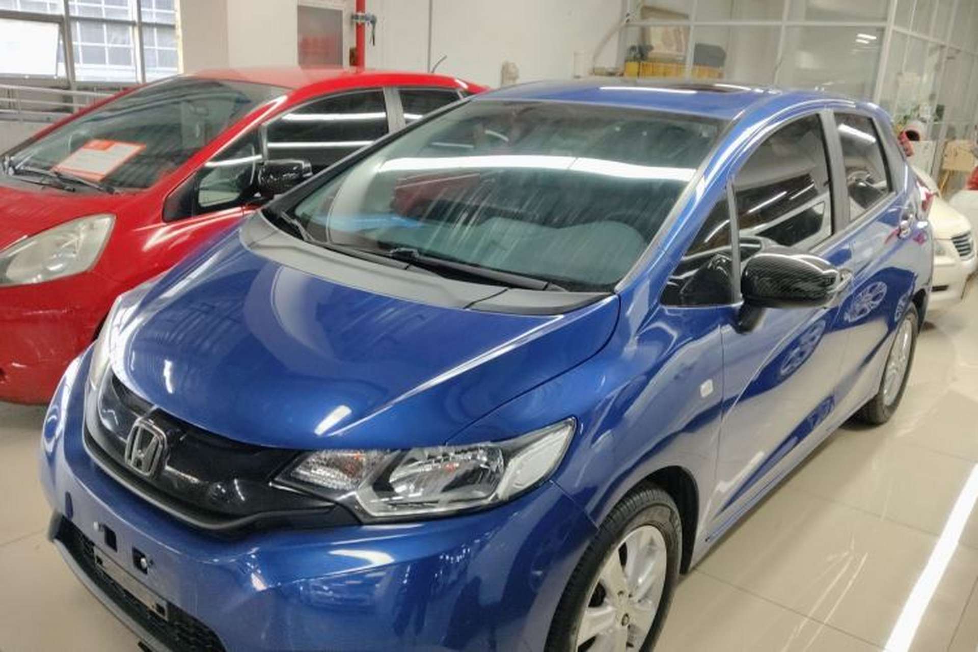 Used Honda Fit 2016 1.5L LXS CVT Comfort Sunroof Version Front Left 45 Deg