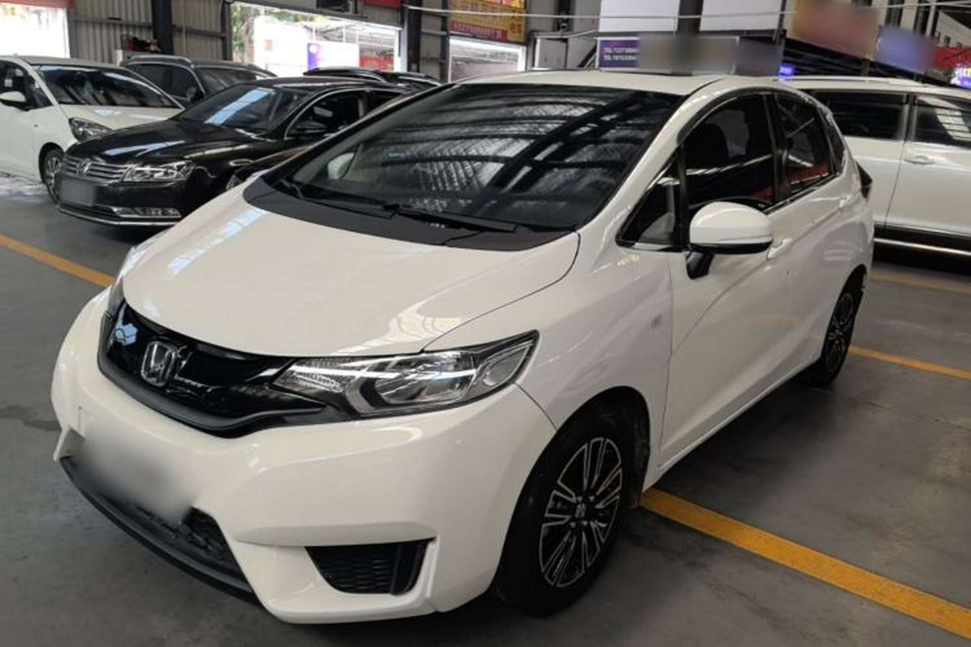 Used Honda Fit 2016 1.5L LXS CVT Comfort Sunroof Version Front Left 45 Deg