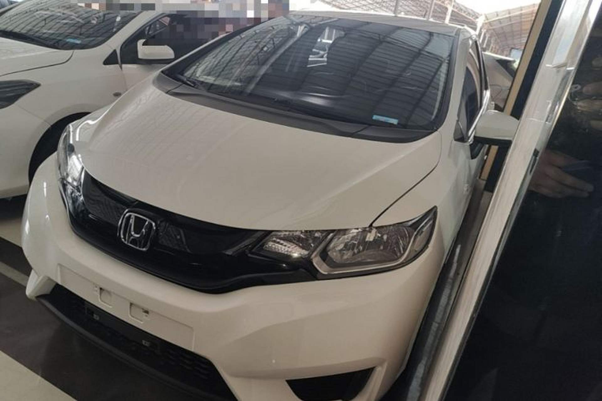 Used Honda Fit 2016 1.5L LXS CVT Comfort Sunroof Version Front Left 45 Deg