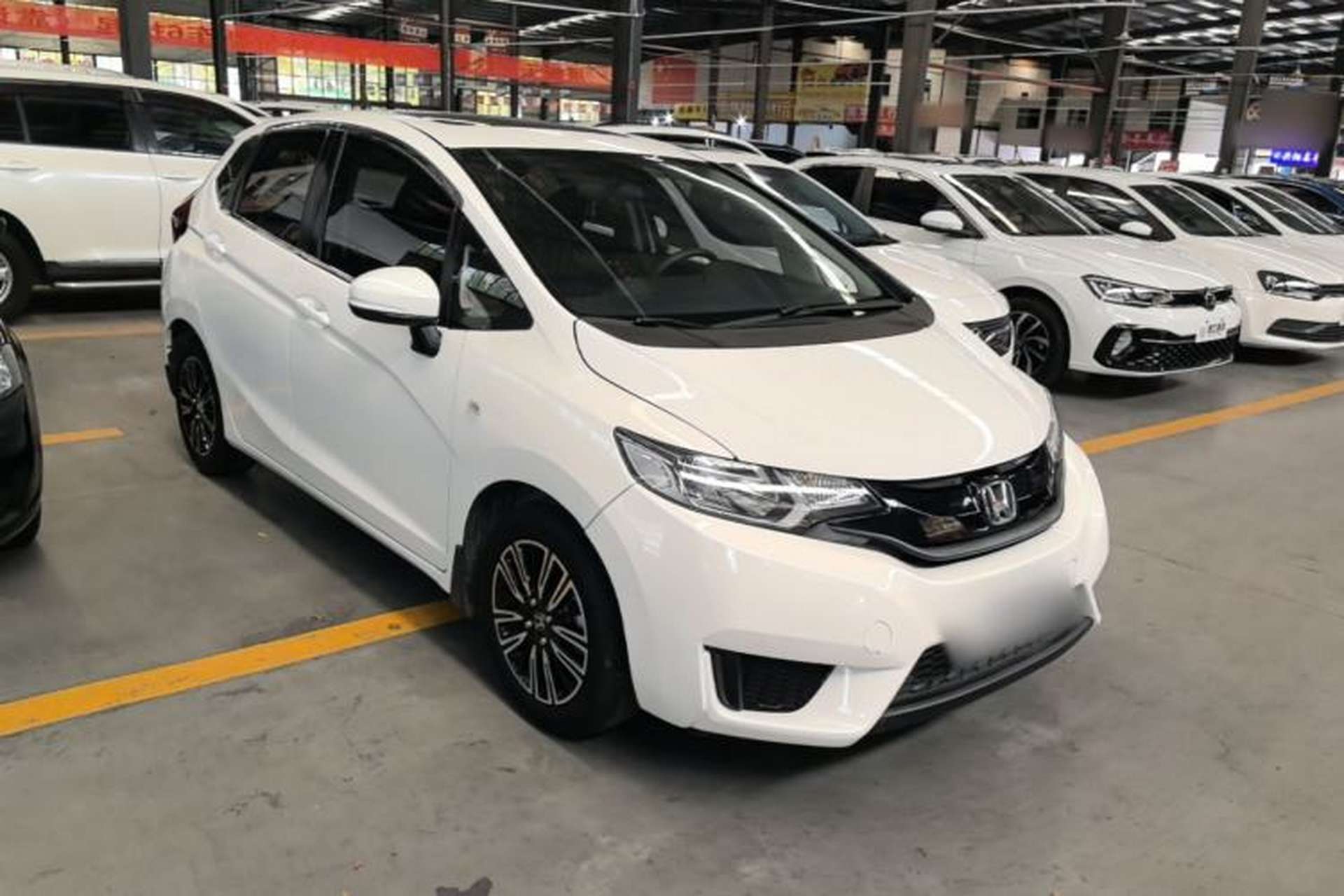 Used Honda Fit 2016 1.5L LXS CVT Comfort Sunroof Version Front Right 45 Deg