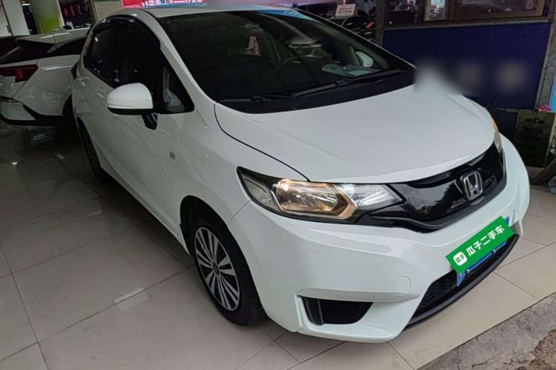 Used Honda Fit 2016 1.5L LXS CVT Comfort Sunroof Version Front Right 45 Deg