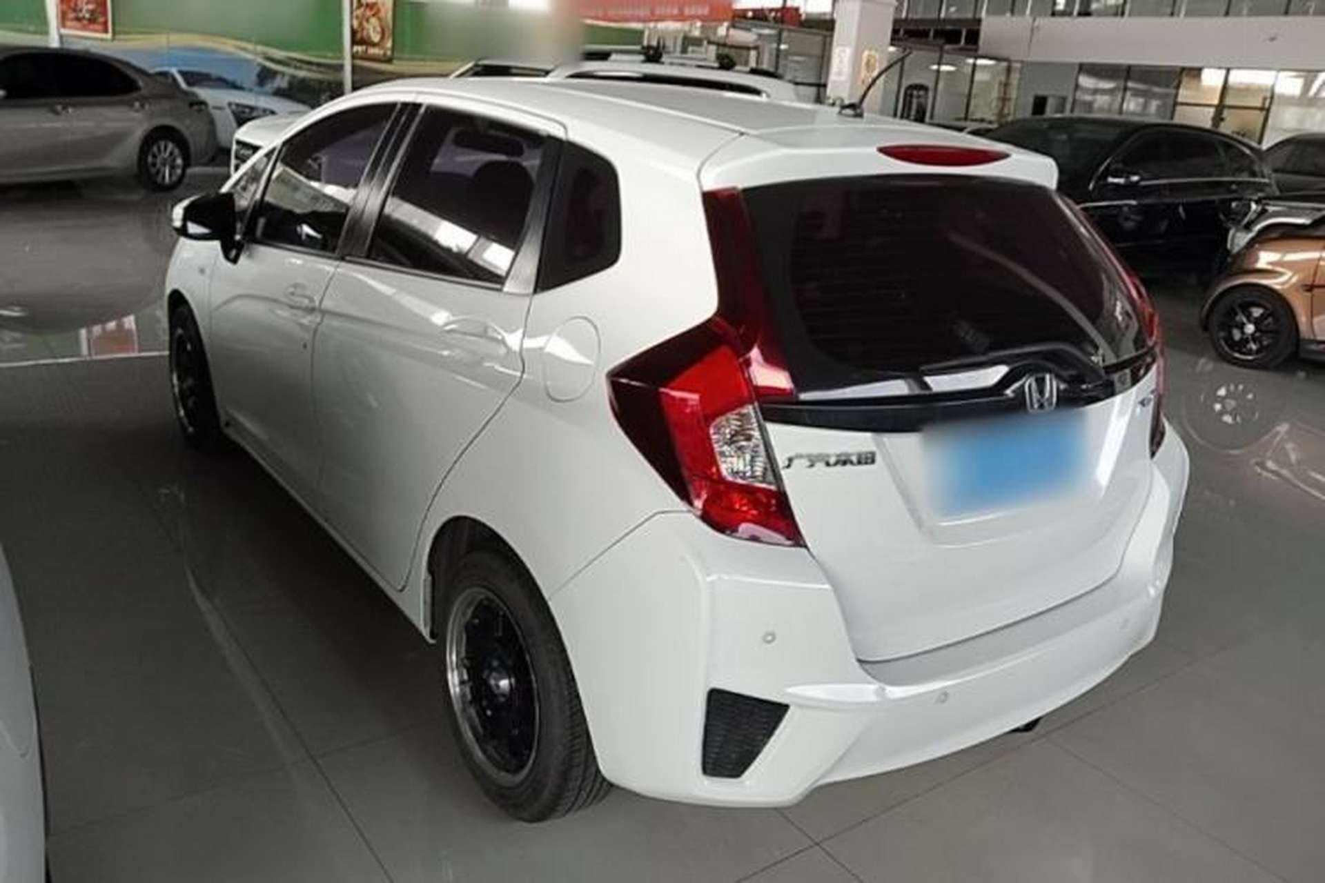 Used Honda Fit 2016 1.5L LX CVT Comfort Model Rear Left 45 Deg