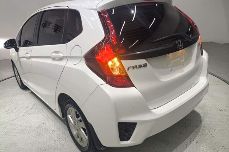 Used Honda Fit 2016 1.5L LX CVT Comfort Model Rear Left 45 Deg