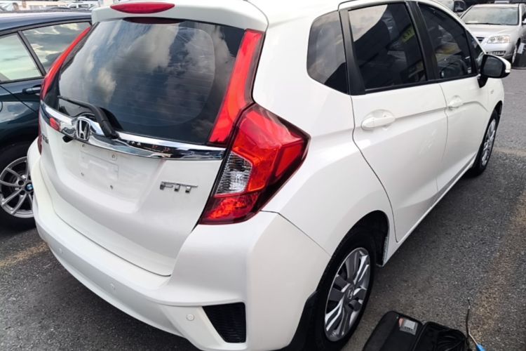 Used Honda Fit 2016 1.5L LX CVT Comfort Model Rear Right 45 Deg