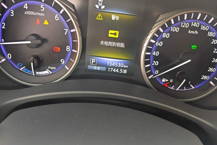 Used Infiniti Q50 2017 3.5L Hybrid Odometer Close Up