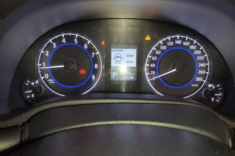 Used Infiniti Q60 2013 3.7L Odometer Close Up