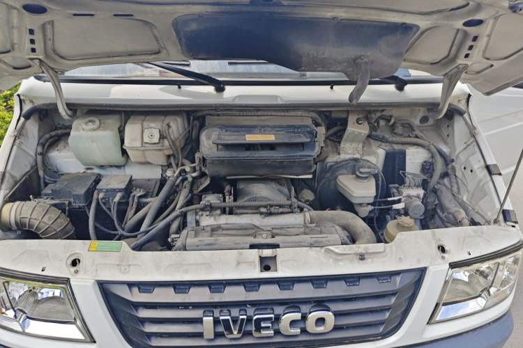 Used Iveco Daily 2020 2.5T A35 Passenger Van Single-Tire Mid-Roof Design 5-9 Seats China V Emission Standard Engine Bay