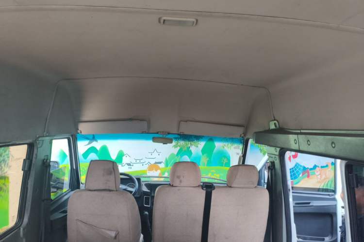 Used Iveco Daily 2020 2.5T A35 Passenger Van Single-Tire Mid-Roof Design 5-9 Seats with Sliding Side Door Meeting China V Emission Standards Headliner