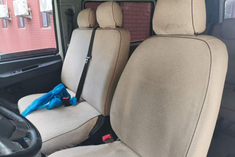 Used Iveco Daily 2020 2.5T A35 Passenger Van Single-Tire Mid-Roof Design 5-9 Seats with Sliding Side Door Meeting China V Emission Standards Left Front Seat