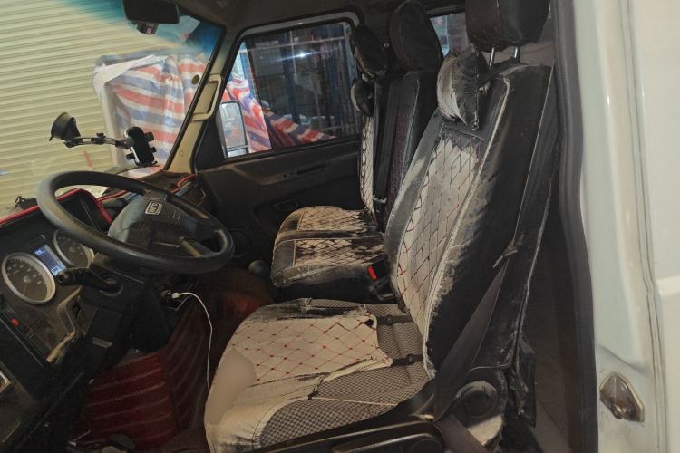 Used Iveco Daily 2020 2.5T A35 Passenger Van with Dual Tires Mid-Roof Design 5-9 Seater Side-Sliding Door China V Emission Standard Left Front Seat