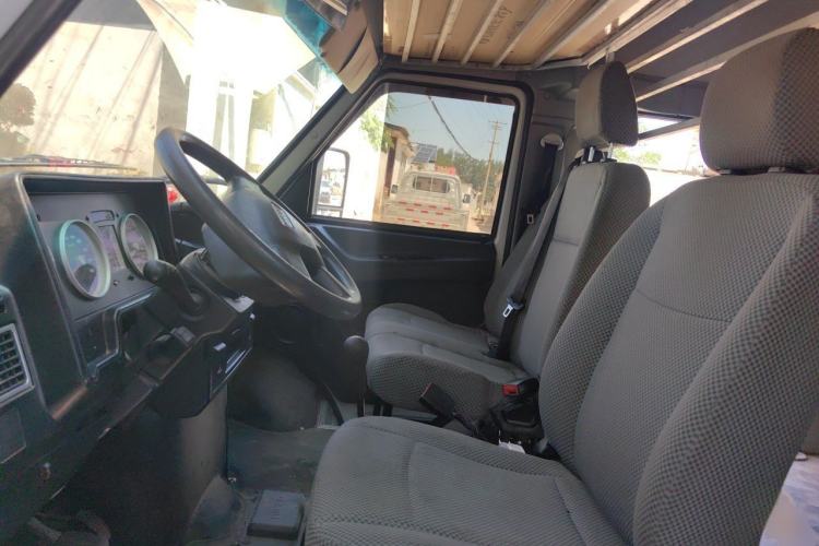 Used Iveco Daily 2021 2.5T M1 Dedicated Platform Vehicle 5-9 Seater Long Wheelbase Mid-Roof Design with Dual Tires and Side Sliding Doors Left Front Seat