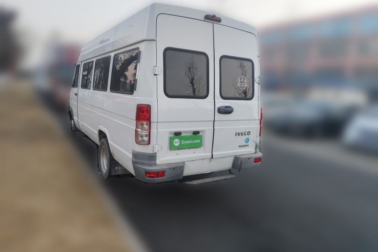Used Iveco Daily 2021 2.5T A40 M1 Passenger Van 5-9 Seats Long Wheelbase Mid-Roof Design Dual Tires Manual Doors Rear Left 45 Deg