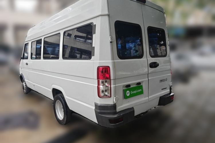 Used Iveco Daily 2021 2.5T A40 M1 Passenger Van 5-9 Seats Long Wheelbase Mid-Roof Design Dual Tires Manual Doors Rear Left 45 Deg