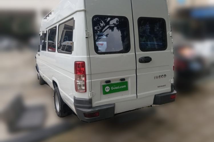 Used Iveco Daily 2021 2.5T A40 M1 Passenger Van 5-9 Seats Long Wheelbase Mid-Roof Design Dual Tires Manual Doors Rear Left 45 Deg