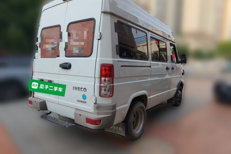 Used Iveco Daily 2021 2.5T A35 M1 Passenger Van 5-9 Seater Short Wheelbase Mid-Roof Design Dual Tires Side Sliding Door Rear Right 45 Deg