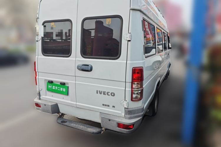 Used Iveco Daily 2021 2.5T A40 M1 Passenger Van 5-9 Seats Long Wheelbase Mid-Roof Design Dual Tires Manual Doors Rear Right 45 Deg