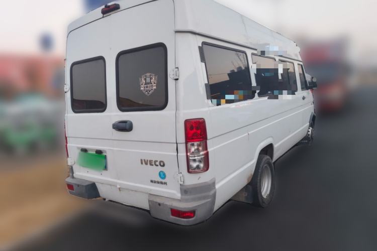 Used Iveco Daily 2021 2.5T A40 M1 Passenger Van 5-9 Seats Long Wheelbase Mid-Roof Design Dual Tires Manual Doors Rear Right 45 Deg