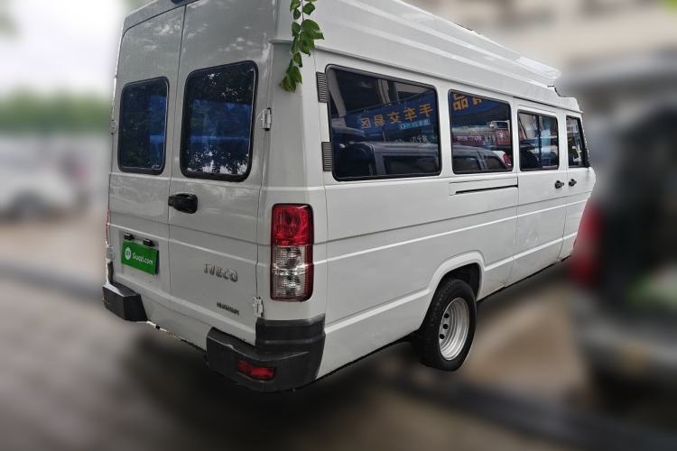 Used Iveco Daily 2021 2.5T A40 M1 Passenger Van 5-9 Seats Long Wheelbase Mid-Roof Design Dual Tires Manual Doors Rear Right 45 Deg