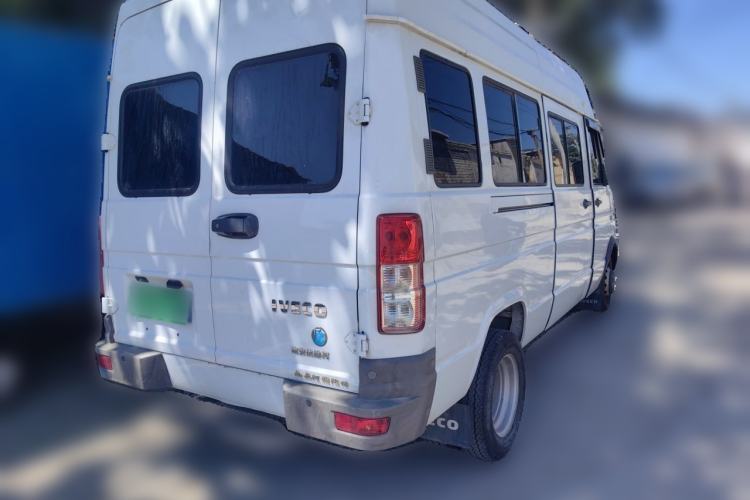 Used Iveco Daily 2021 2.5T M1 Dedicated Platform Vehicle 5-9 Seater Long Wheelbase Mid-Roof Design with Dual Tires and Side Sliding Doors Rear Right 45 Deg