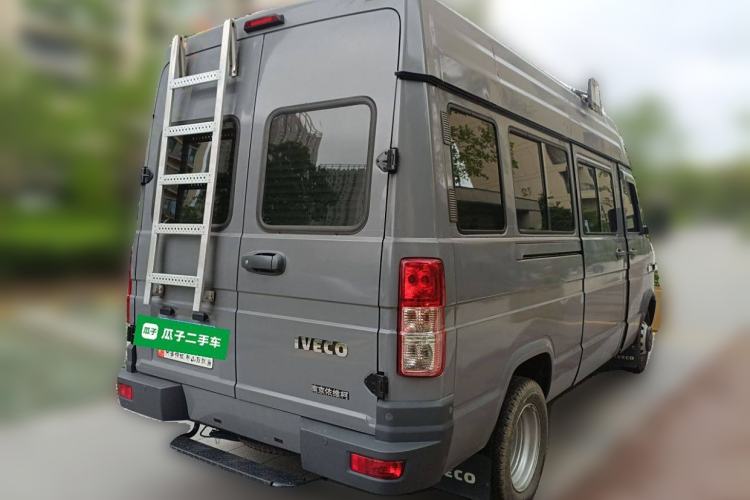Used Iveco Daily 2022 2.5T A37 M1 Passenger Van 5-9 Seats Long Wheelbase Mid-Roof Design Dual Tires Side Sliding Doors Rear Right 45 Deg
