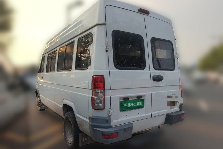 Used Iveco Daily 2022 2.5T A37 M1 Passenger Van 5-9 Seats Long Wheelbase Mid-Roof Design Dual Tires Manual Doors Rear Left 45 Deg