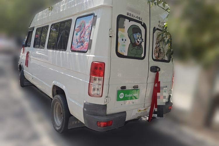 Used Iveco Daily 2022 2.5T A37 M1 Passenger Van 5-9 Seats Long Wheelbase Mid-Roof Design Dual Tires Side Sliding Doors Rear Left 45 Deg