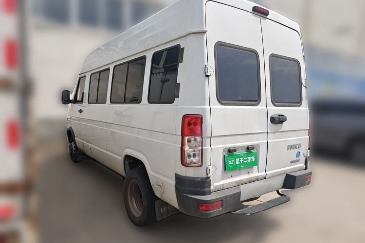 Used Iveco Daily 2022 2.5T A37 M1 Passenger Van 5-9 Seats Long Wheelbase Mid-Roof Design Dual Tires Side Sliding Doors Rear Left 45 Deg