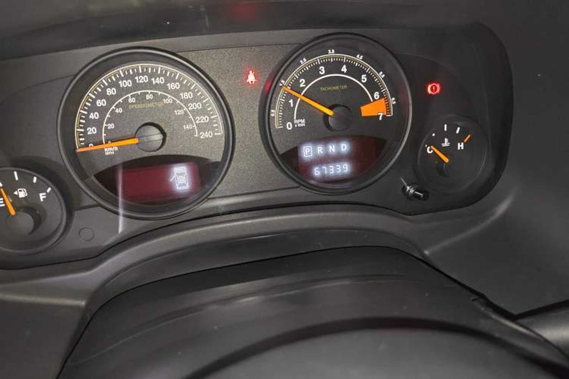 Used Jeep Compass 2013 2.0L two-wheel drive sport version Odometer Close Up