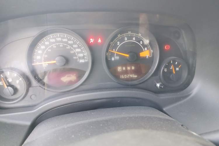 Used Jeep Compass 2014 2.0L two-wheel drive sport version Odometer Close Up