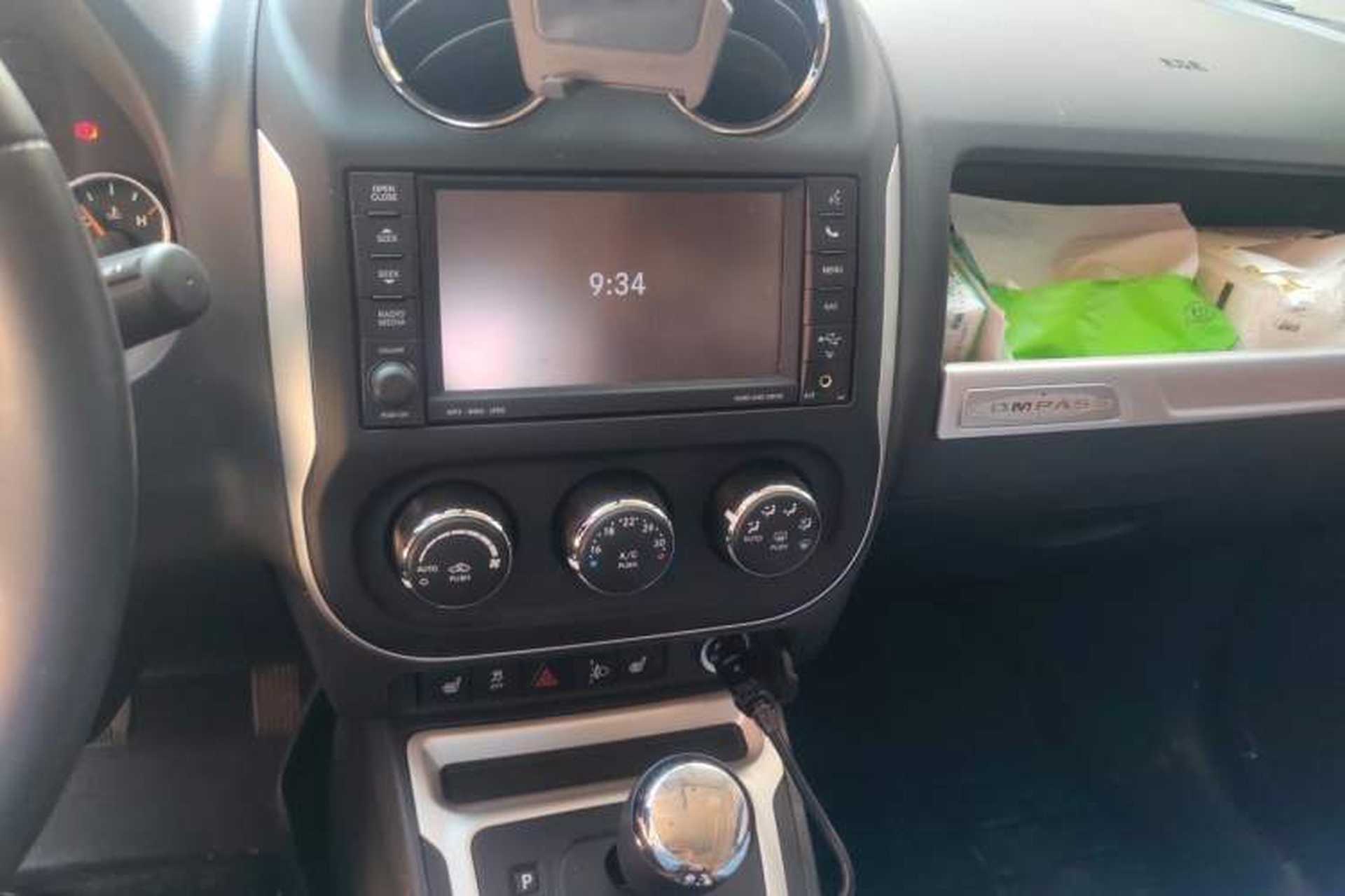 Used Jeep Compass 2014 2.4L four-wheel drive luxury navigation version Audio And AC Panel