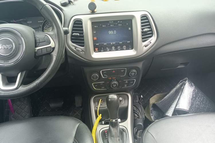 Used Jeep Compass 2017 200T Automatic Family Edition Audio And AC Panel