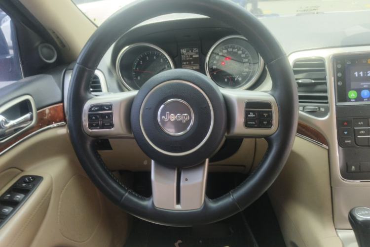 Used Jeep Grand Cherokee 2011 3.6L Luxury Navigation Edition Steering Wheel