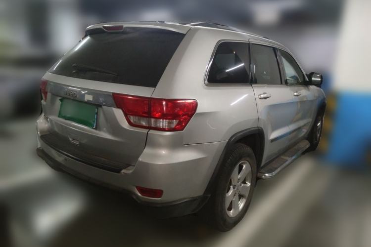 Used Jeep Grand Cherokee 2011 Revised Version 3.6L Anniversary Edition Navigation and Comfort Package Rear Right 45 Deg