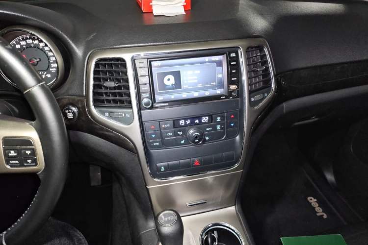 Used Jeep Grand Cherokee 2012 3.6L Comfort Navigation Edition Audio And AC Panel