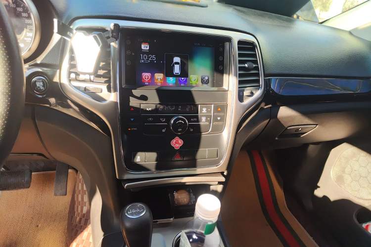 Used Jeep Grand Cherokee 2012 3.6L Comfort Navigation Edition Audio And AC Panel