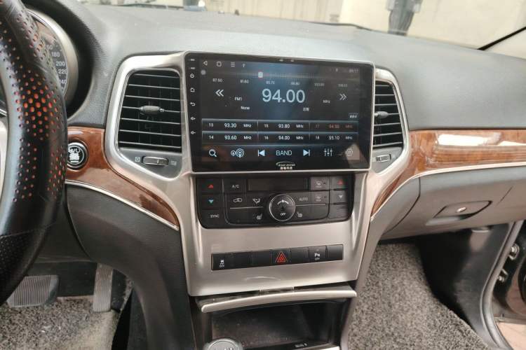 Used Jeep Grand Cherokee 2012 3.6L Anniversary Navigation Edition Audio And AC Panel