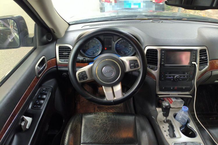 Used Jeep Grand Cherokee 2012 3.6L Luxury Navigation Edition Steering Wheel