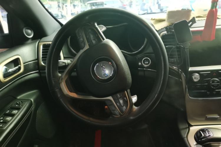 Used Jeep Grand Cherokee 2013 3.6L Comfort Navigation Edition Steering Wheel