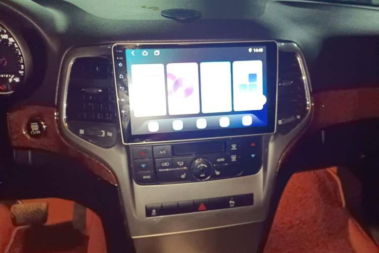 Used Jeep Grand Cherokee 2013 3.6L Comfort Navigation Edition Audio And AC Panel
