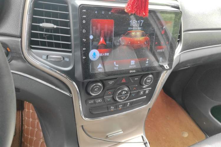 Used Jeep Grand Cherokee 2014 3.6L Elite Navigation Edition Audio And AC Panel