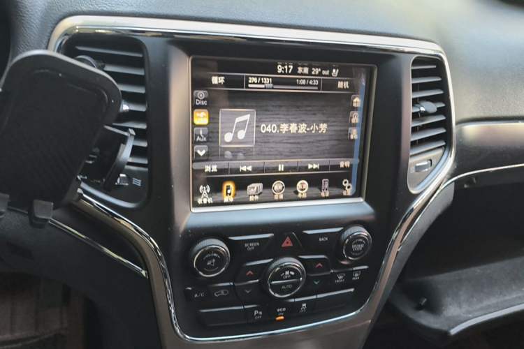 Used Jeep Grand Cherokee 2014 3.6L Elite Navigation Edition Audio And AC Panel