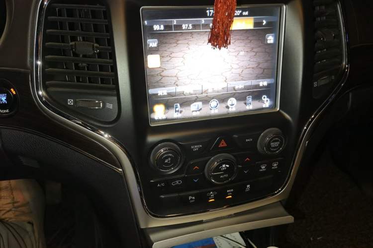 Used Jeep Grand Cherokee 2014 3.6L Elite Navigation Edition Audio And AC Panel