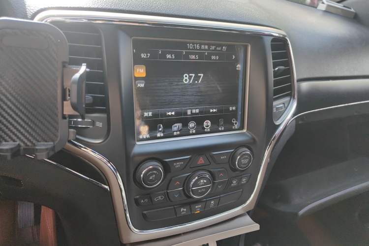 Used Jeep Grand Cherokee 2014 3.6L Elite Navigation Edition Audio And AC Panel