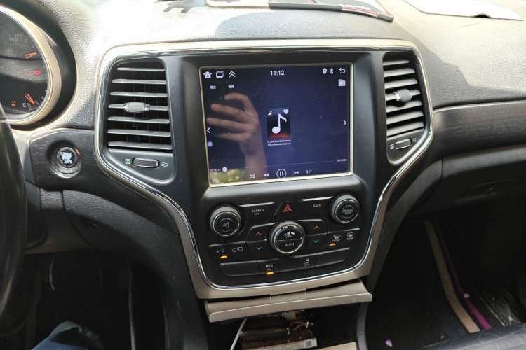 Used Jeep Grand Cherokee 2014 3.6L Comfort Navigation Edition Audio And AC Panel