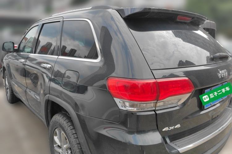 Used Jeep Grand Cherokee 2014 3.6L Elite Navigation Edition Rear Left 45 Deg